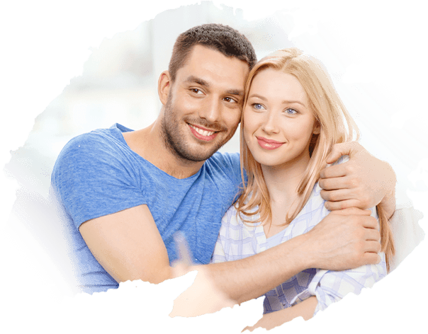 A man and woman hugging each other in a circle.